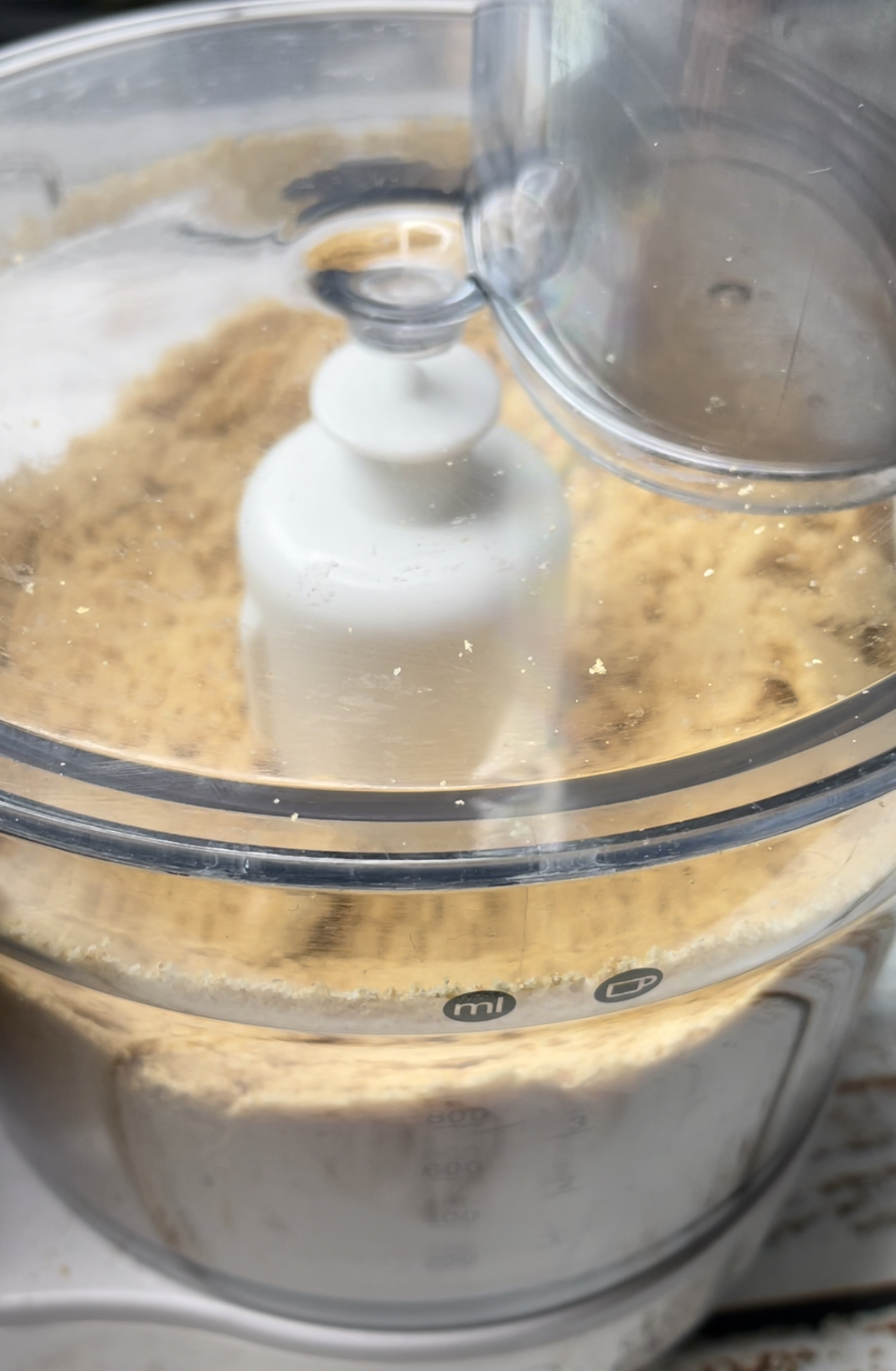 Blitz the biscuits in a food processor, or smash using a rolling pin.