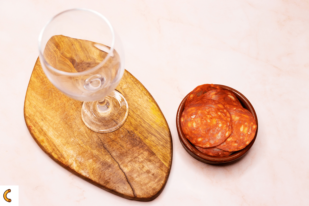 Wine glass and salami